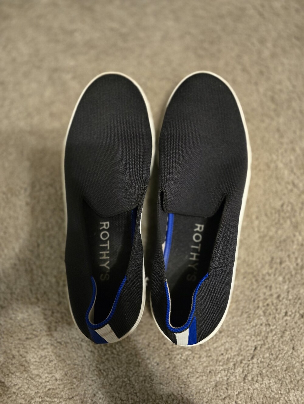 Rothy's Black Knit Slip-On Sneakers with Blue Trim